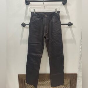 Brown leather pants.